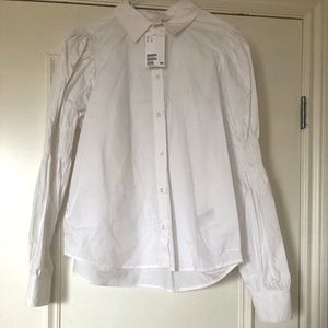 H&M crisp white blouse with arm details